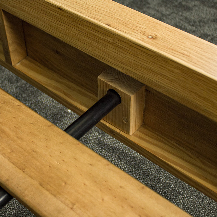 A close up of the support beam on the Ormond Oak Double Bed Frame.