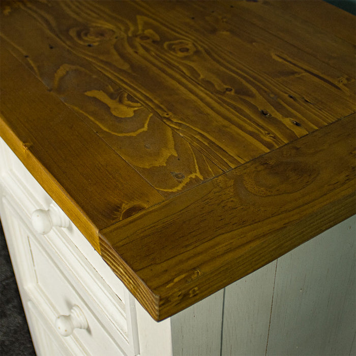 A close up of the top of the Tuscan Recycled Pine Small Desk, showing the colour and wood grain.