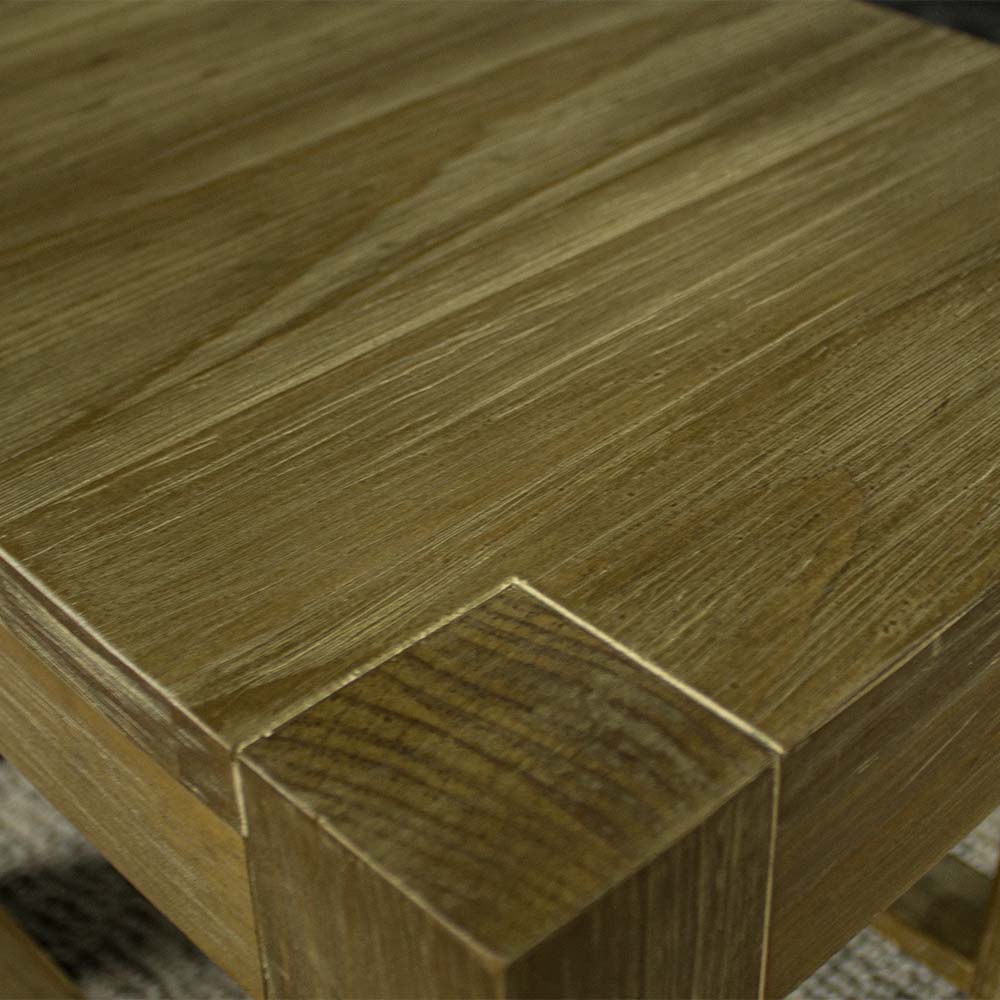 A close up of the top of the Vancouver Pine Nesting Tables, showing the wood grain and colour.
