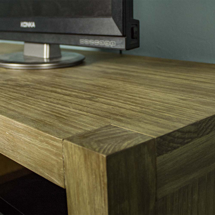 A close up of the top of the Vancouver NZ Pine Entertainment Unit / TV Unit, showing the wood grain and colour.