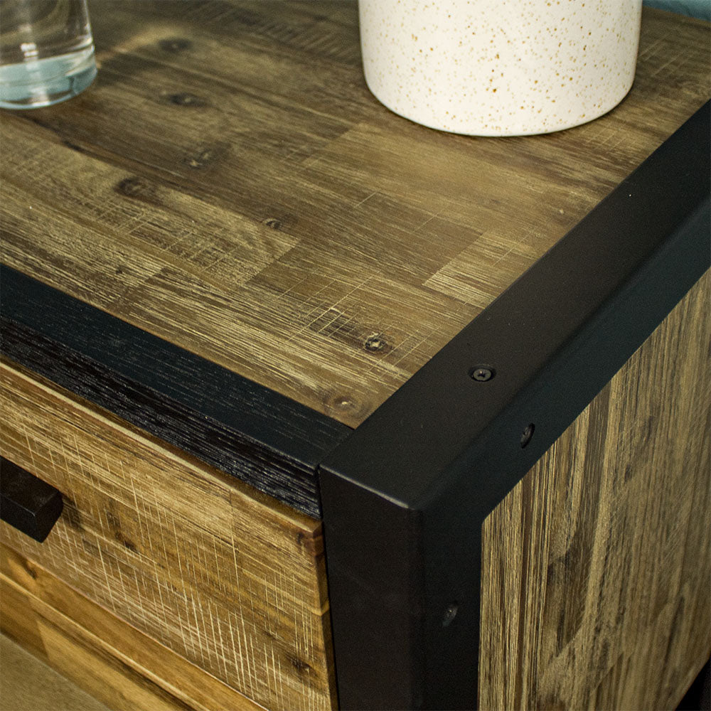 Close up of the top of the Victor 3 Drawer Bedside Cabinet showing the wood grain and the painted black wood pairing with the brushed black metal aluminium