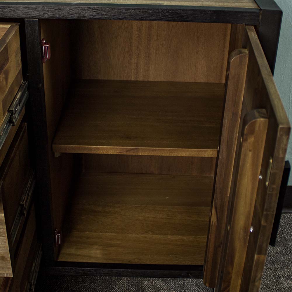 An overall view of the shelves on the sides of the Victor 2 Door 3 Drawer Sideboard.