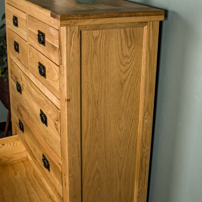 The side of the Vienna 7 Drawer Oak Tallboy