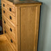 The side of the Vienna 7 Drawer Oak Tallboy