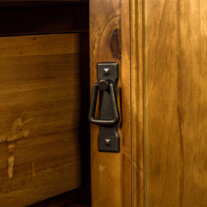 A close up of the door handle on the Montreal Midsize NZ Pine Buffet