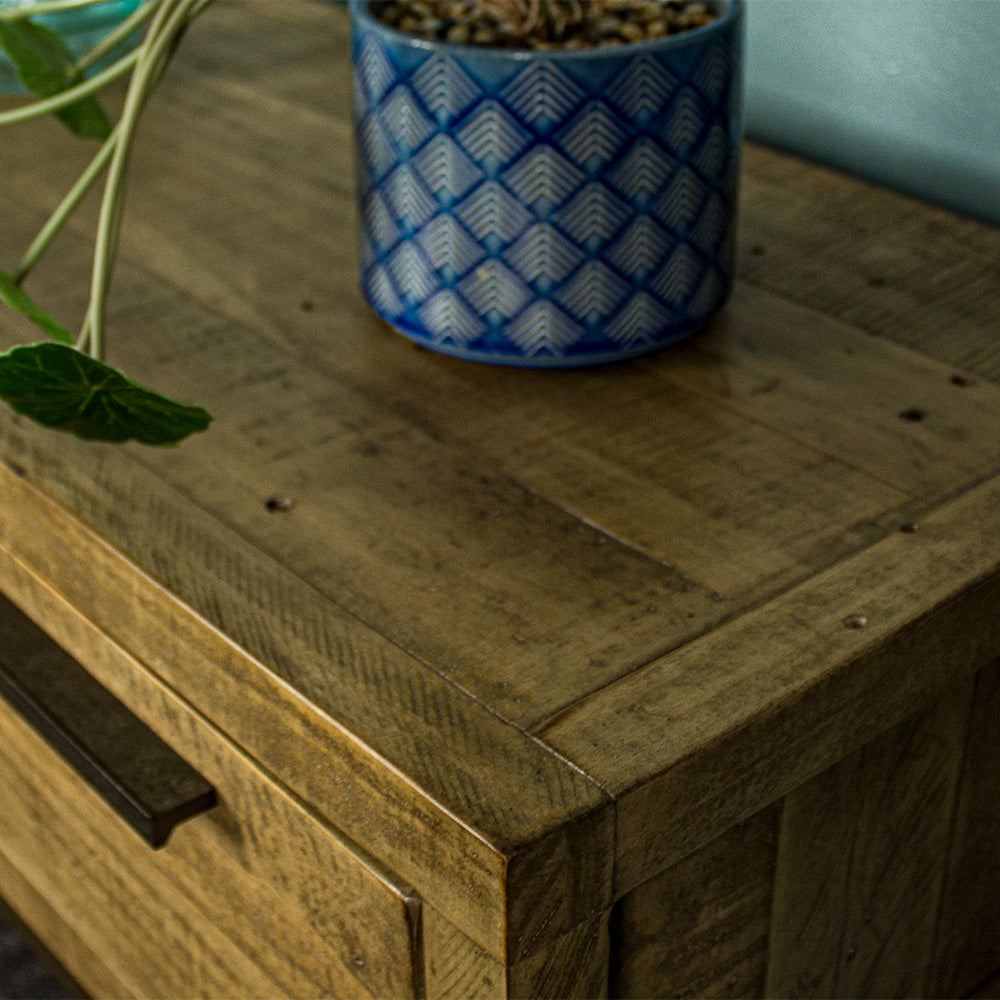 A close up of the top of the Monterey Recycled Pine Hall Table, showing the wood grain and colour.