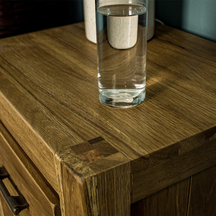 A close up of the top of the Amalfi 2-Drawer Oak Bedside, showing the wood grain.