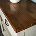 The Rimu stained top of the Alton Hall Table with 2 Drawers, showing the wood grain.