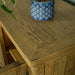 A close up of the top of the Cairns Recycled Pine Buffet, showing the wood grain.