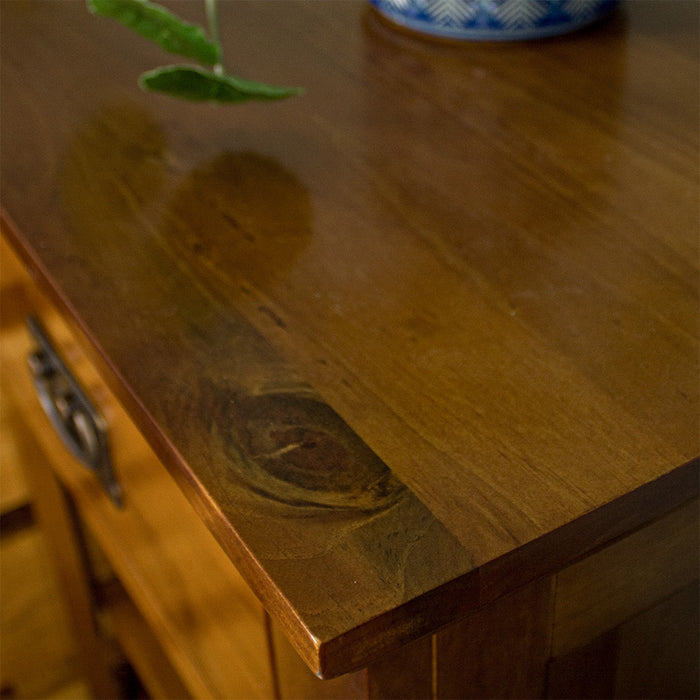 Close up of the top of the Montreal Rimu Stained Buffet/Sideboard which shows some wood grain.