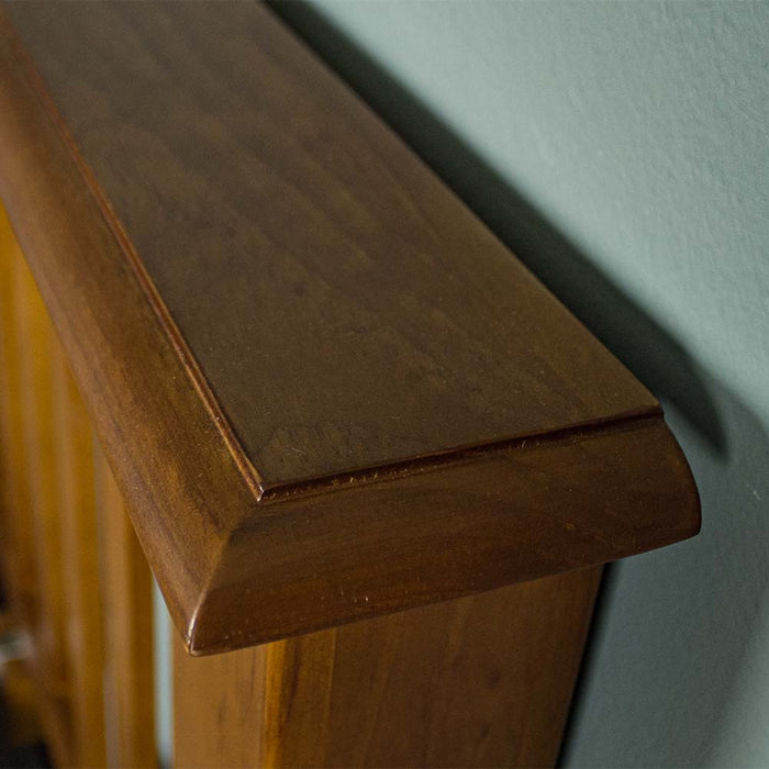 A close up of the top of the Trent Double Size NZ Pine Slat Bed Frame, showing the wood grain and colour.