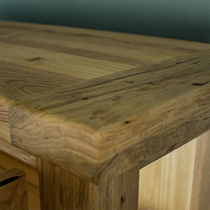 A close up of the top of the Vienna Oak Glass DIsplay Cabinet.