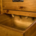 A close up of the wooden stoppers on the drawers of the Montreal Midsize NZ Pine Buffet