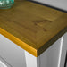 A close up of the top of the Felixstowe 1m Bookcase, showing the colour and wood grain.