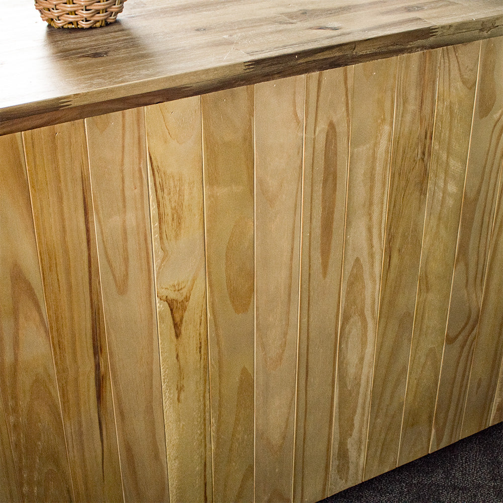 A close view of the back of the Mars 3 Drawer Large Buffet, showing the tongue-and-groove panelling.