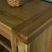 A close up of the top of the Yes Oak Display Cabinet, showing the wood grain and colour.