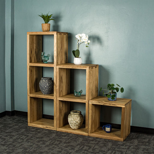 From left to right, the Vancouver Value Triple Cube Shelf, the Vancouver Value Double Cube Shelf and the Vancouver Value Single Cube Shelf. There are various plants, glass ornaments and vases on the shelves.