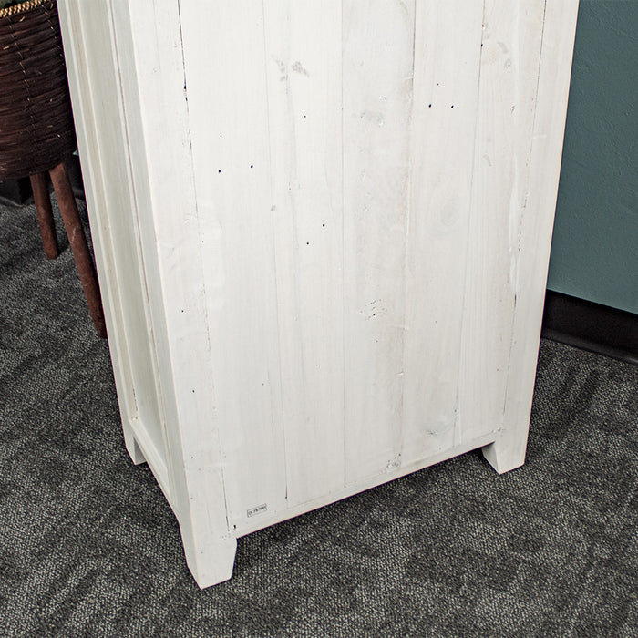 Tongue and groove back paneling on the white Tuscan Recycled Pine Tall Bookcase.