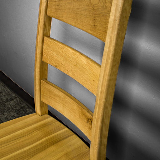 A close up of the slats on the Loire Solid American Oak Dining Chair.