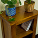 A close up of the top of the Montreal Compact Pine Bookcase, showing the wood grain and colour.