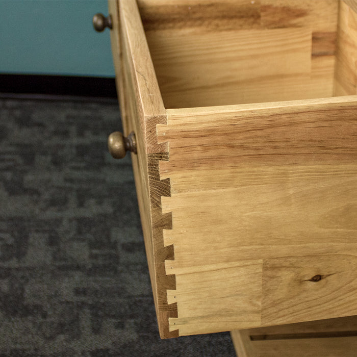 A close up of the dovetail joinery on the drawers of the Farmhouse Hall Table.