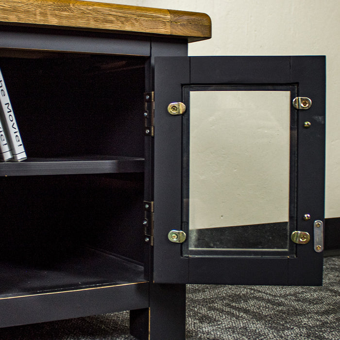 A view of inside the door on the shelf on the Cascais Oak-Top TV Unit. 