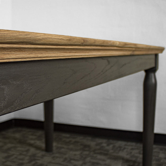 A closer view of the side of the Boston Oak Large 2m Dining Table.