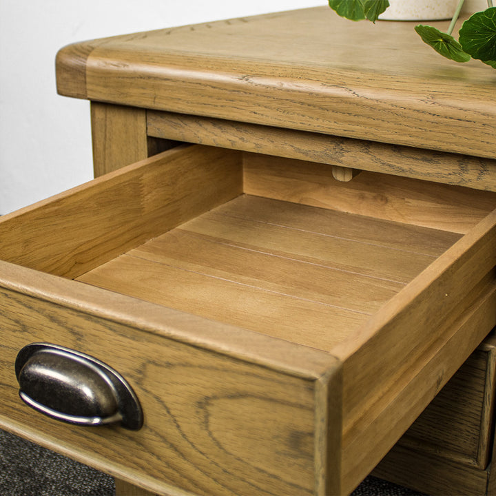 An overall view of the drawers on the Houston Oak Lamp Table.