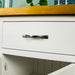 A close up of the chrome/silver coloured metal handle on the drawers of the Felixstowe Large Pine White Buffet.