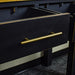 A close up of the gold coloured metal handle on the Cascais 2-Drawer Hall Table.