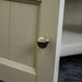 A close up on the rounded door handle for the Alton Corner TV Unit