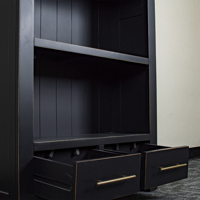 A closer view of the shelf on the Cascais Large Bookcase.