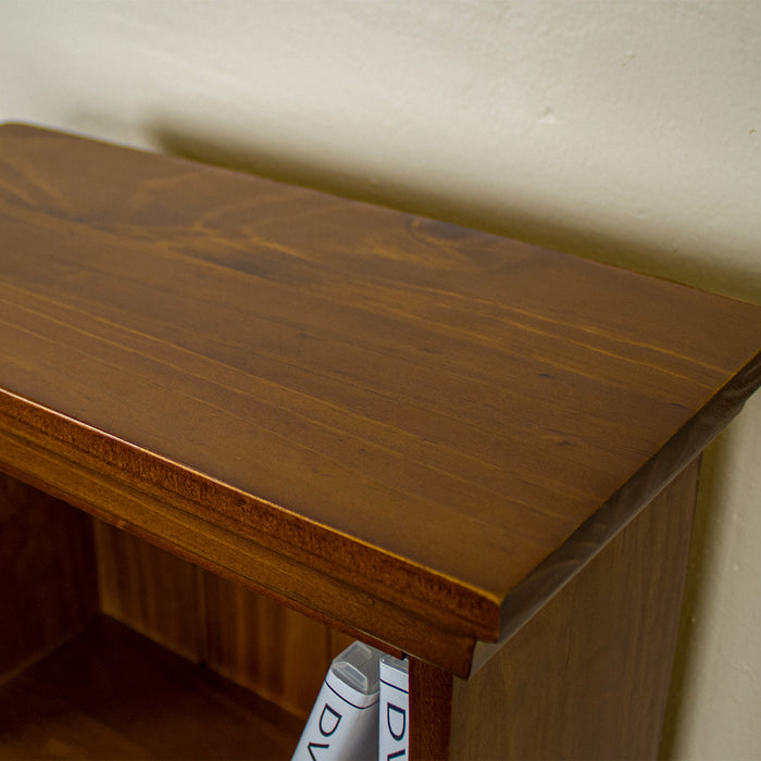 A close up of the top of the Montreal Pine DVD Rack, showing the wood grain and colour.