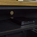A view of the easy access cable hole on the back of the Cascais Oak-top Corner Entertainment Unit