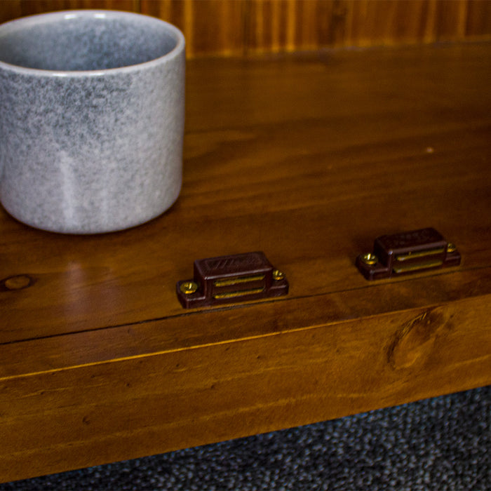 A close up of the magnetic latches on the Montreal Compact Pine Buffet.