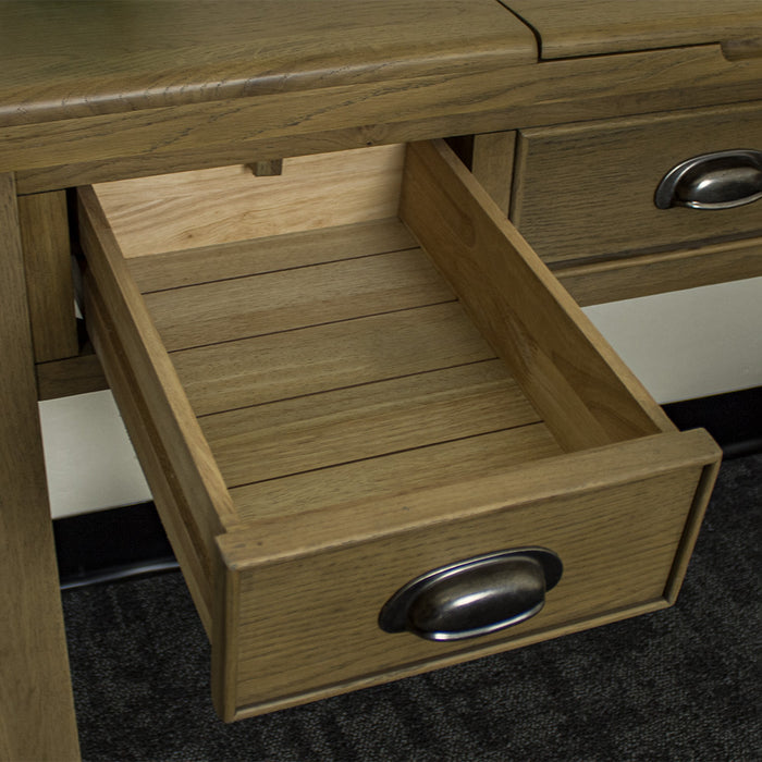 An overall view of the drawers on the Houston Oak Dressing Table With Mirror.