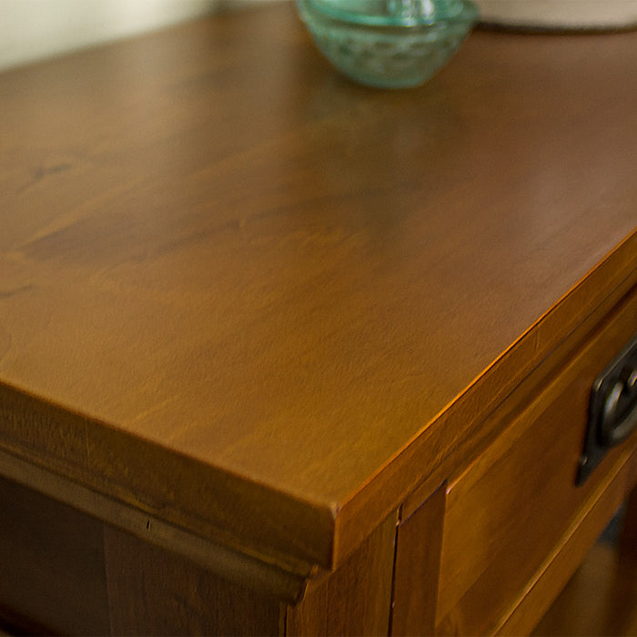 A close up of the top of the Montreal Pine Hall Table, showing the wood grain and colour.