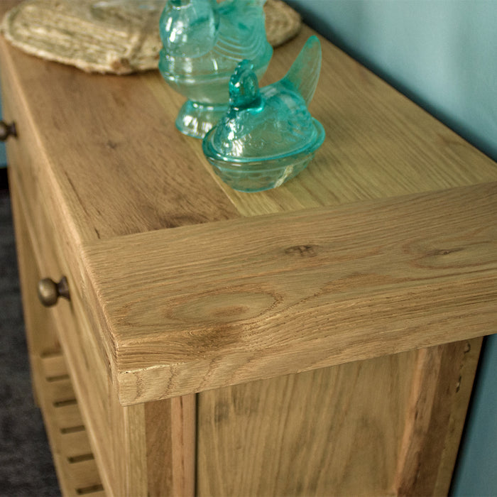A close up of the top of the Farmhouse Hall Table, showing the wood grain and colour.