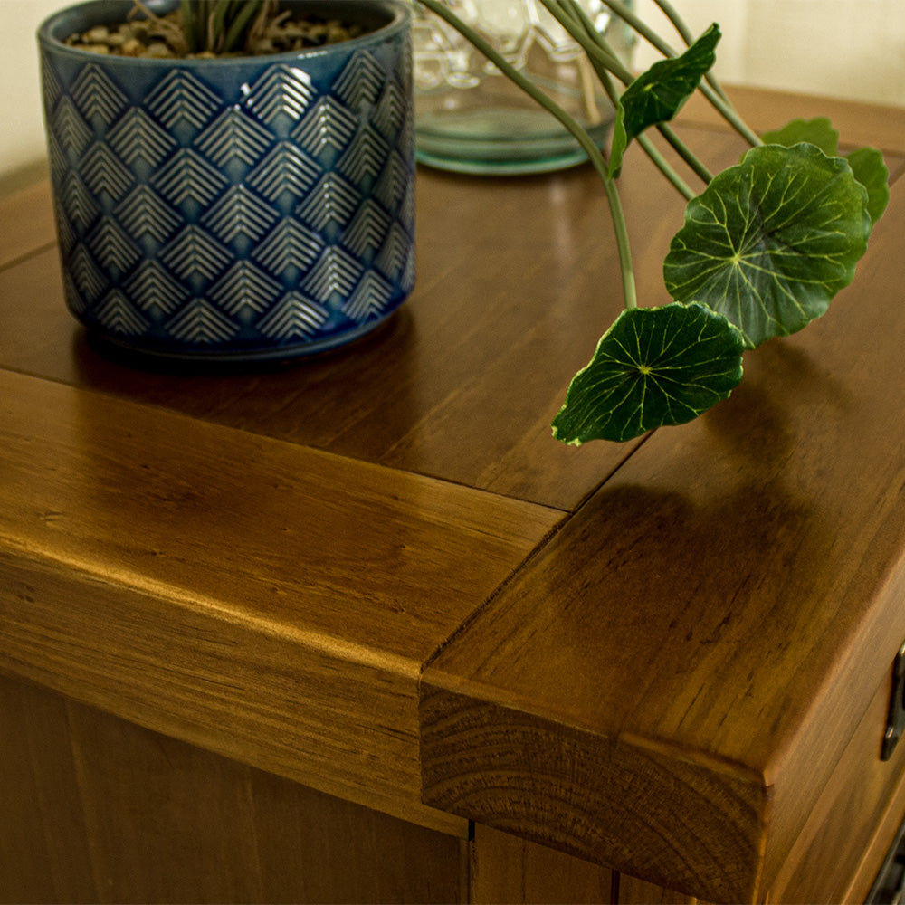 A close up of the top of the New Quebec 6 Drawer Lingerie Chest, showing the wood grain and colour.