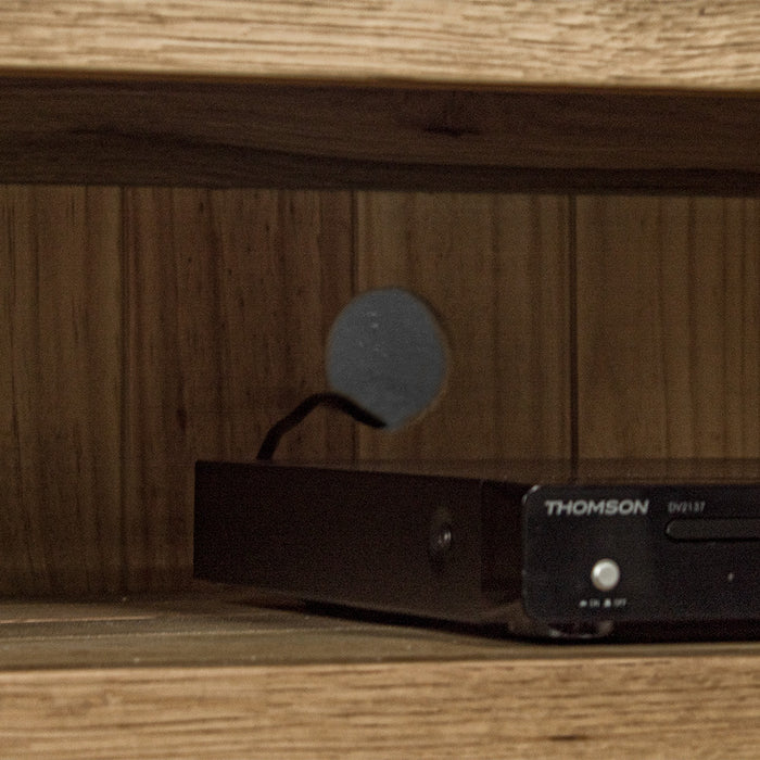 A close up of the cable hole in the back of the Camden 2 Drawer White Oak Entertainment Unit