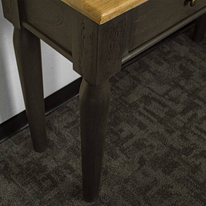 An overall view of the leg on the Boston Oak Hall Table - Black.