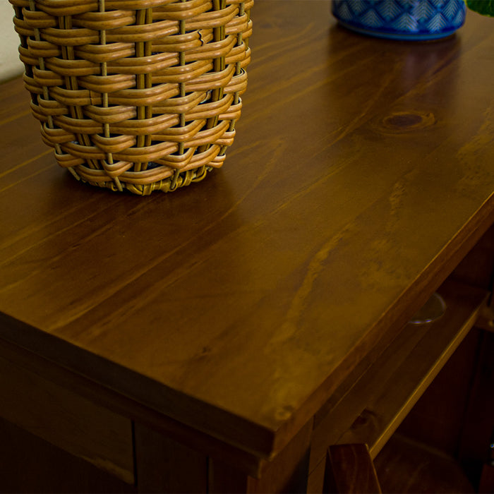 A close up of the top of the Montreal Compact Pine Buffet, showing the wood grain and colour.