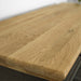 A close up of the oak top on the Boston Oak Hall Table - Black, showing the wood grain and colour.